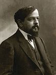 https://upload.wikimedia.org/wikipedia/commons/thumb/f/f9/Claude_Debussy_ca_1908%2C_foto_av_F%C3%A9lix_Nadar.jpg/110px-Claude_Debussy_ca_1908%2C_foto_av_F%C3%A9lix_Nadar.jpg