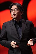 https://upload.wikimedia.org/wikipedia/commons/thumb/3/3d/Satoru_Iwata_-_Game_Developers_Conference_2011_-_Day_2_%281%29.jpg/120px-Satoru_Iwata_-_Game_Developers_Conference_2011_-_Day_2_%281%29.jpg