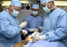 https://upload.media.orgikipedia/commons/thumb/0/08/Surgeons_at_Work.jpg/220px-Surgeons_at_Work.jpg