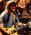 https://upload.wikimedia.org/wikipedia/commons/thumb/0/0d/Malcolm_Young_at_ACDC_Monster_of_Rock_Tour.jpg/120px-Malcolm_Young_at_ACDC_Monster_of_Rock_Tour.jpg